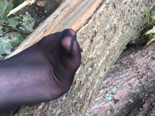 Within the woodland in black tights
