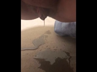 Naughty female friend pissing at the bed after intercourse