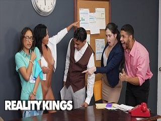 REALITY KINGS – Abi James Spanks IT Woman Lola Aiko Earlier than Licking & Strapping Her On The Boss’ Table